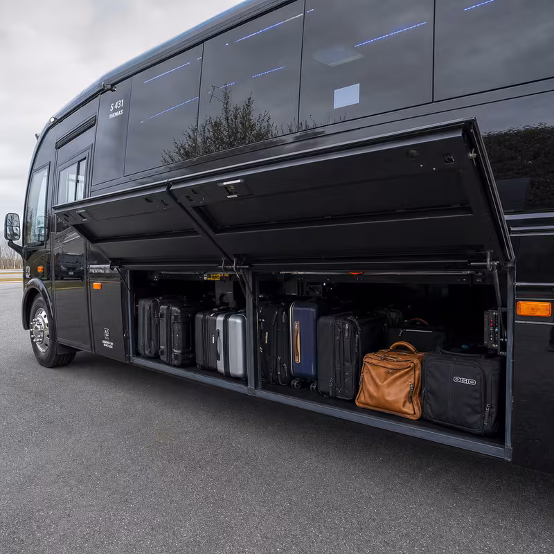 Party bus interior with wraparound leather seating and LED lighting in Grand Rapids