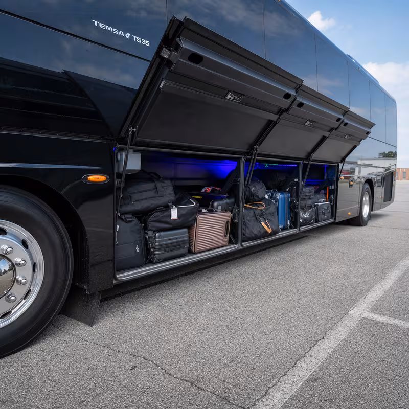 Party bus interior with wraparound leather seating and LED lighting in Grand Rapids